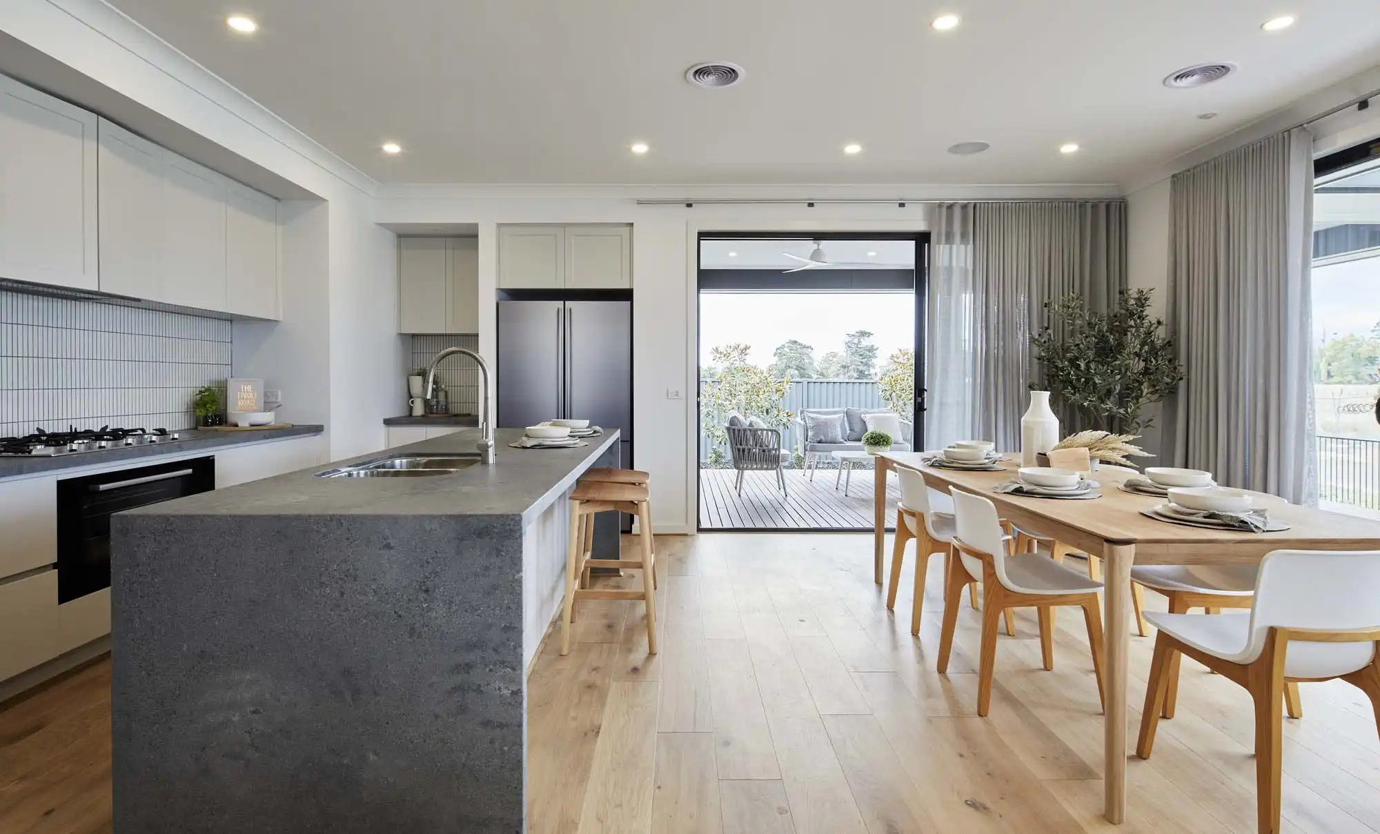 rustic style single storey home with stoned countertop and light wood flooring at dromana 28