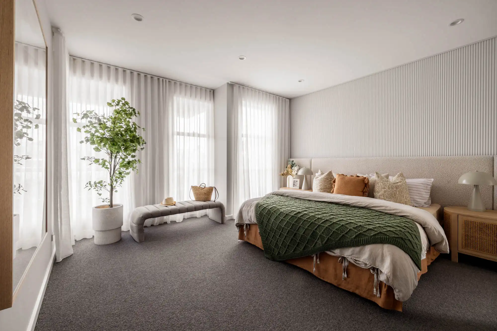 Wood cladding as a feature wall in Master bedroom at the Tallowood 52