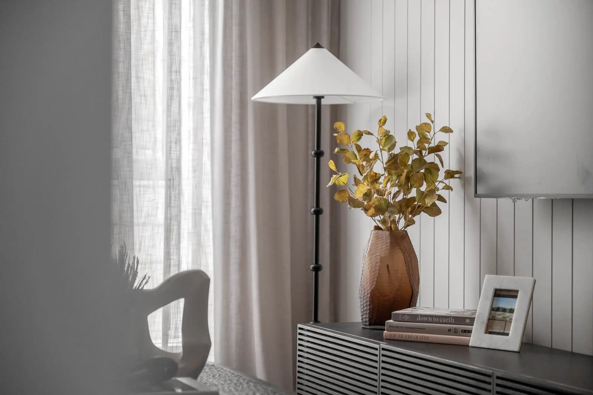 Close up interiors with wood cladding feature wall and soft curtains at the Nowra 26