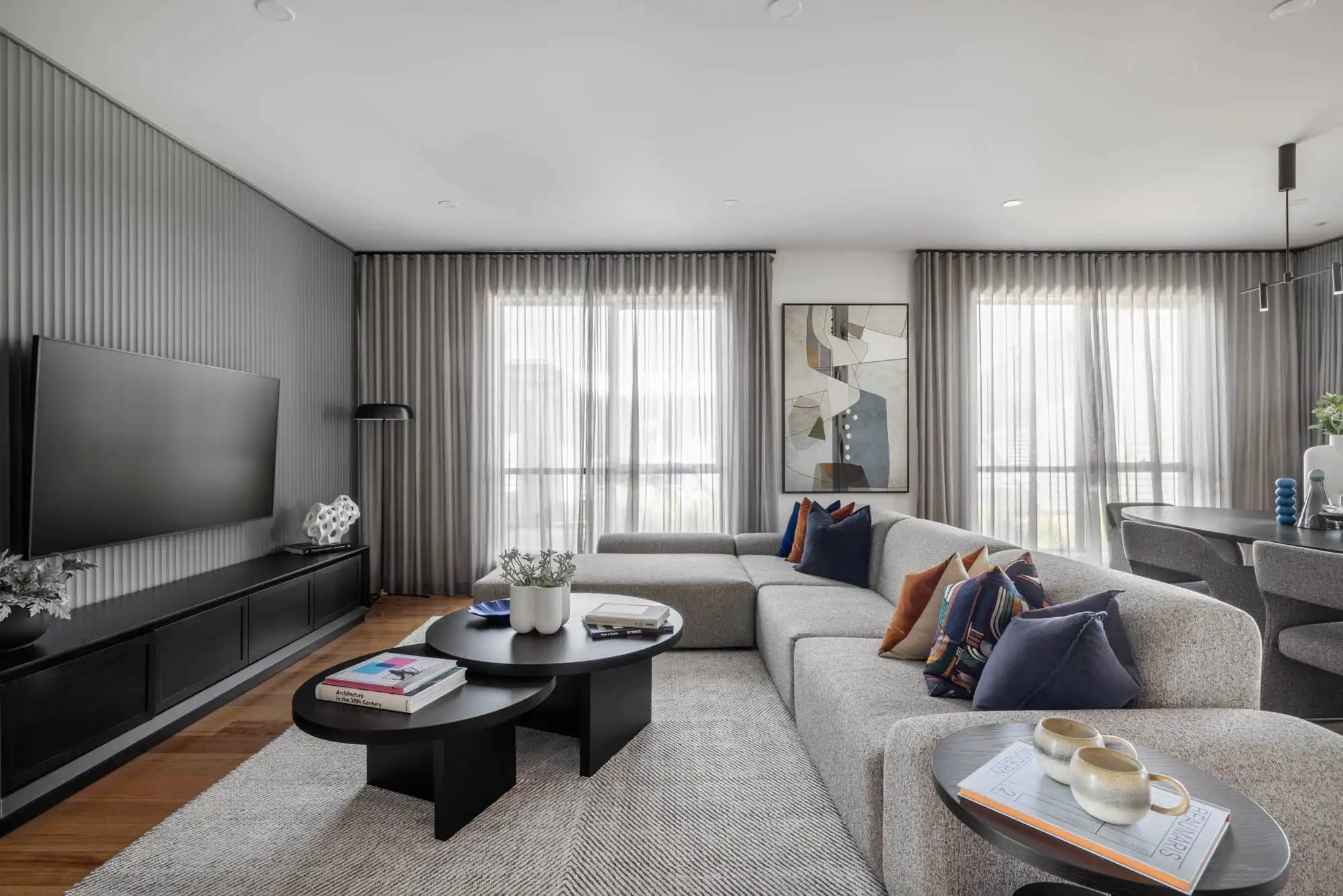 Cladding feature wall and floor to ceiling curtains at the Victor 29 in Riverlea South Australia