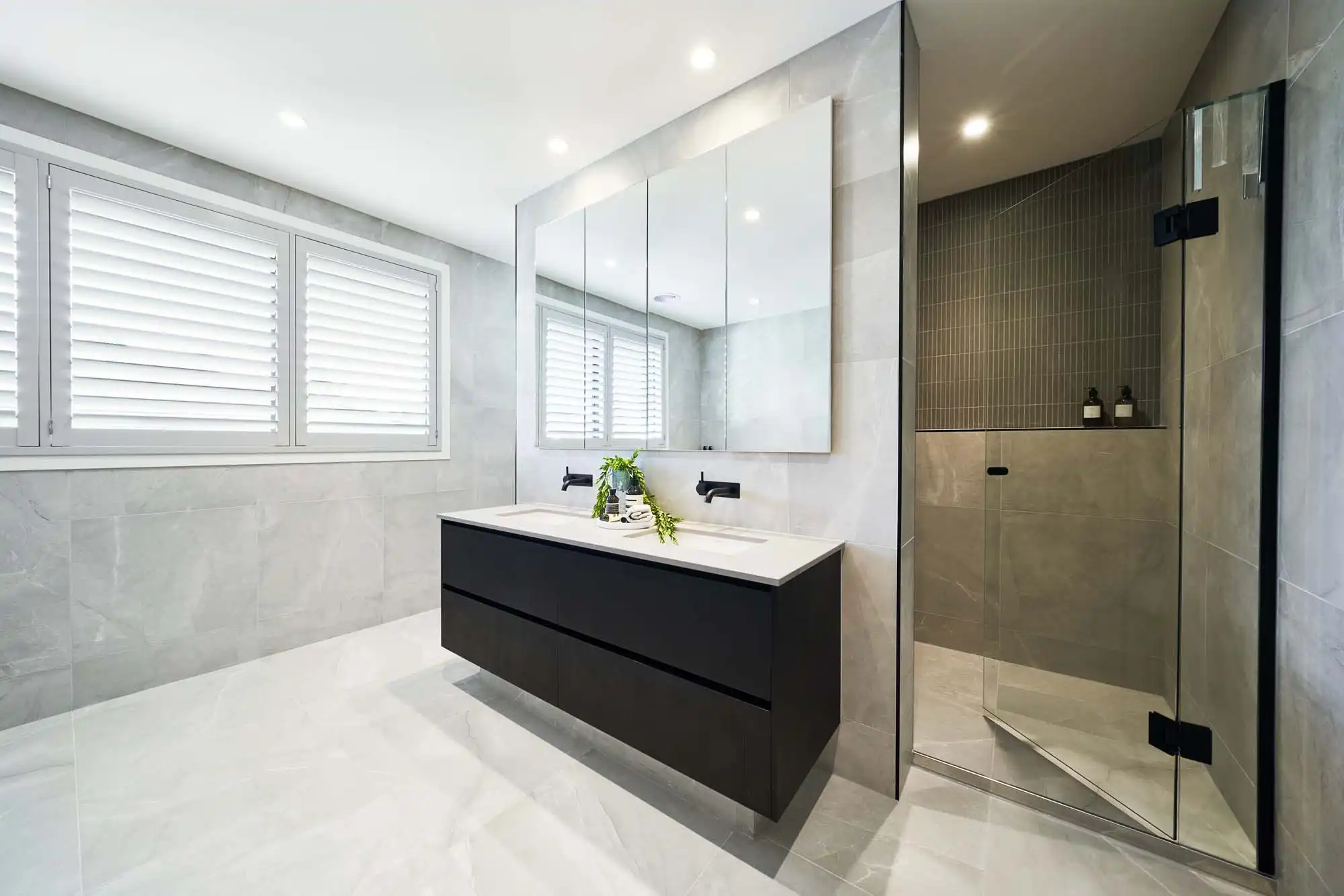 dual sinks and matte black features of this modern design at castlemaine 41