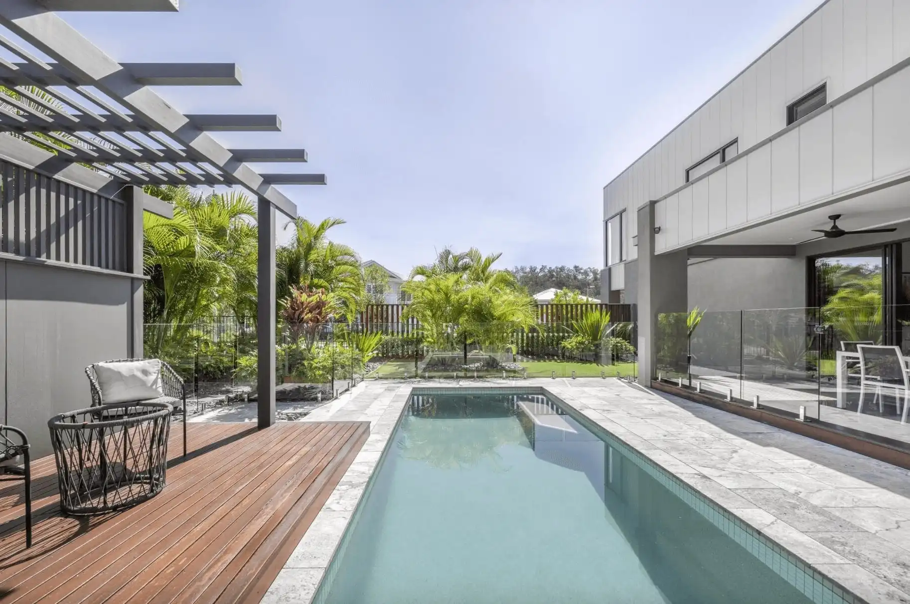 Simonds colston 26 in queensland featuring a wide backyard with with pool and pergola