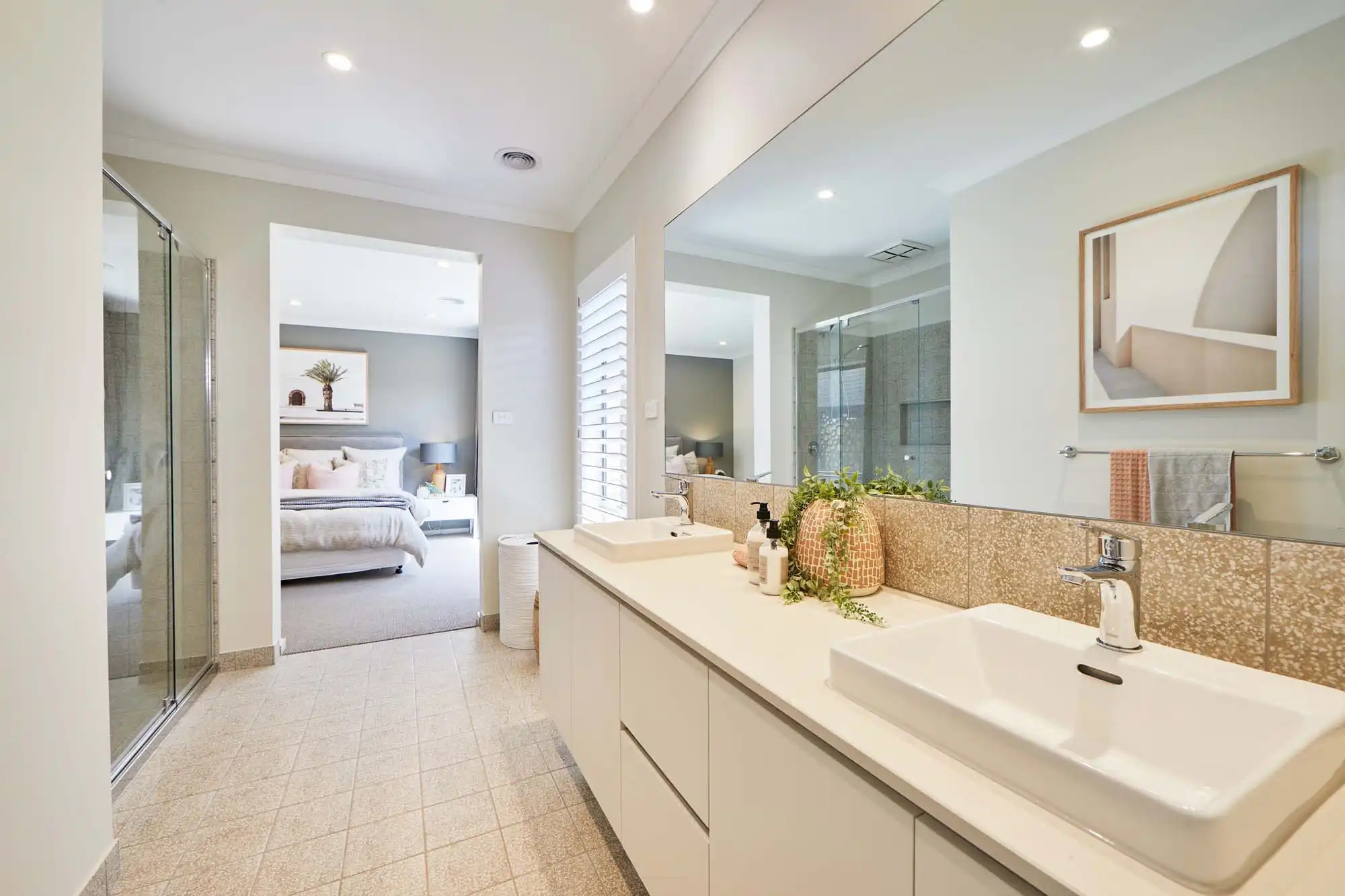 neutral mid-century modern bathroom connecting into the master suite at curlew 27