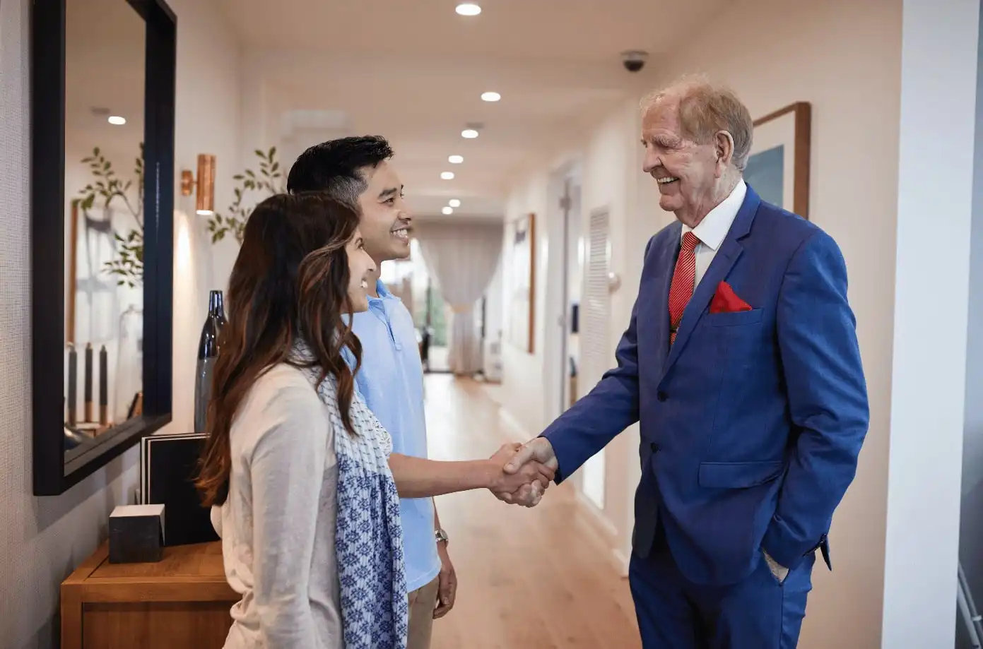Gary simonds congratulating a first home buyer with a simonds built