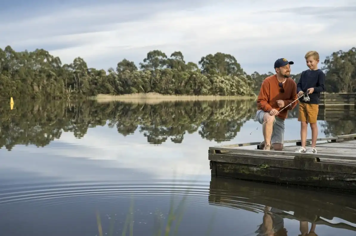 A photo of a father and son fishing at a pond in Kinley Estate, Lilydale
