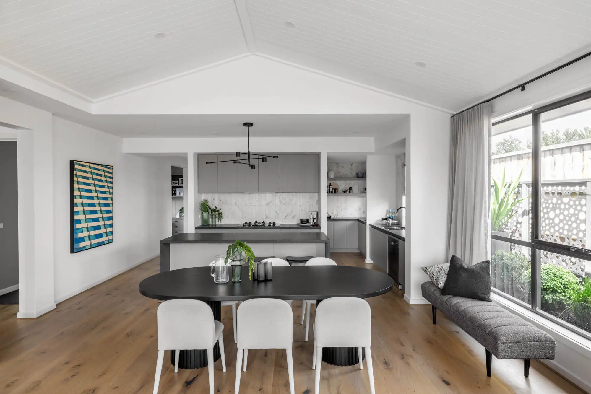 country-modern home with an arched raked wooden cladding on ceiling at berrima 28 in warragul