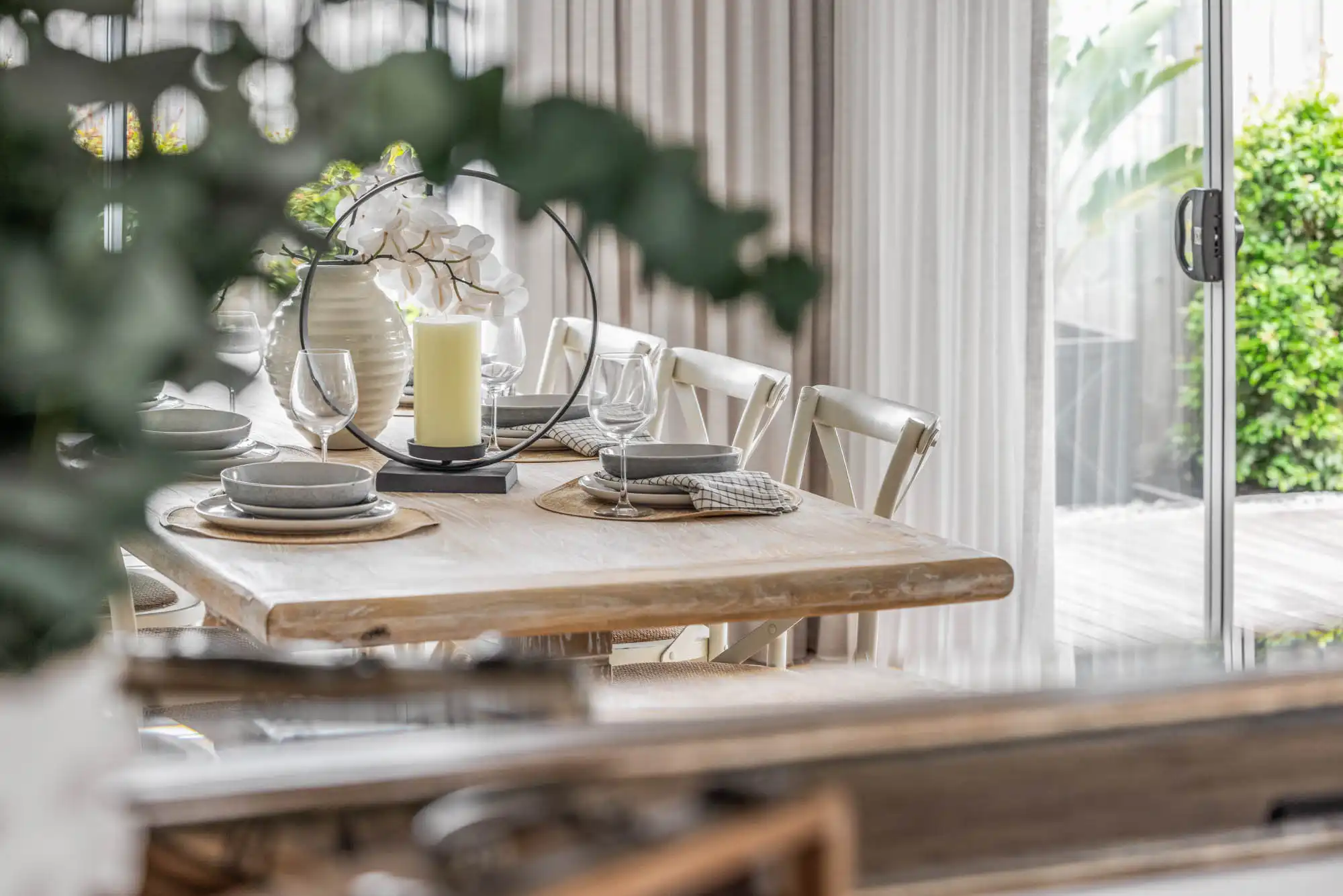 adding timber to your living and dining space design with indoor plants to brighten up the space at granite 23