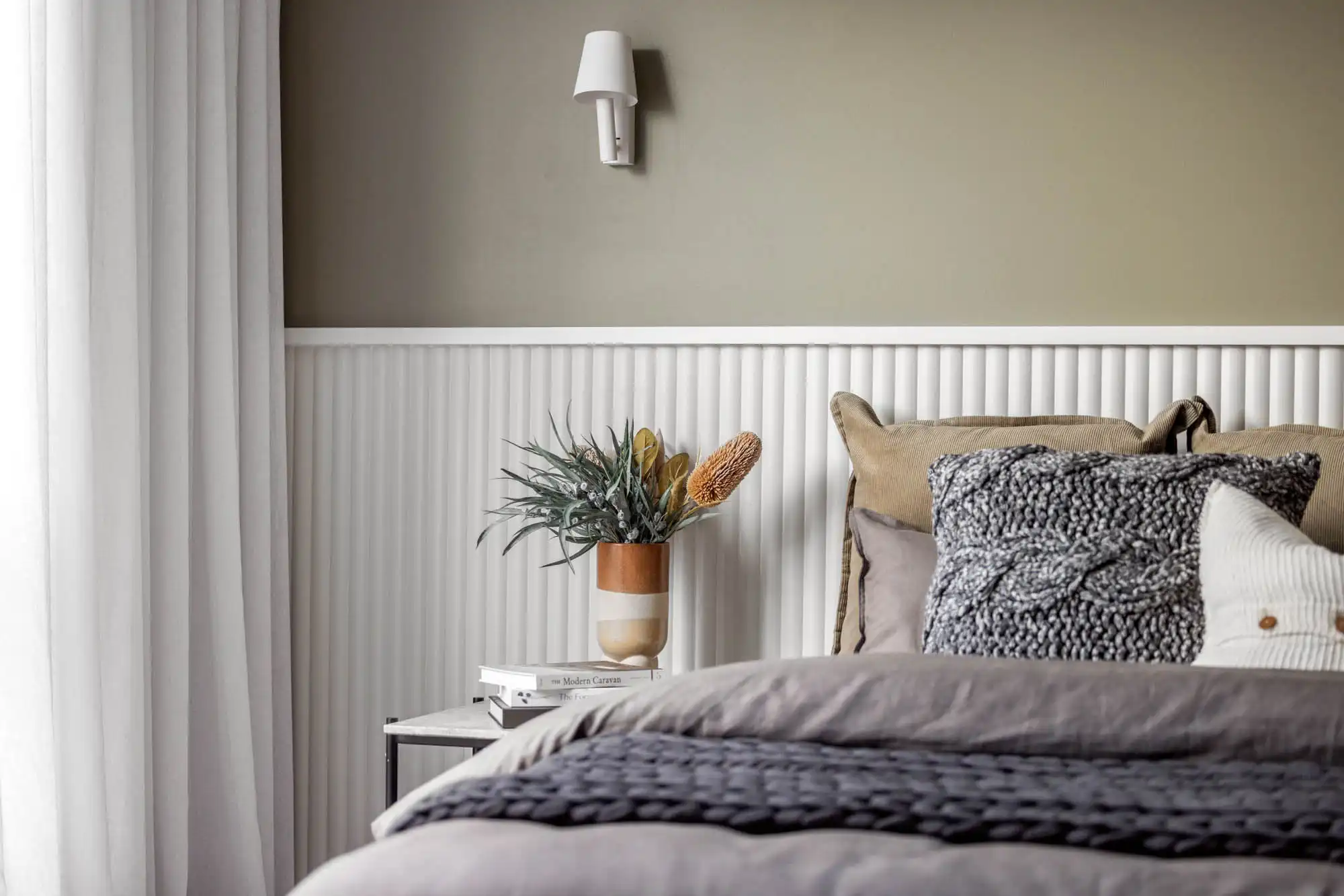 a cosy and elegant bedroom layered with a mix of textures and colours nowra 26 gisborne