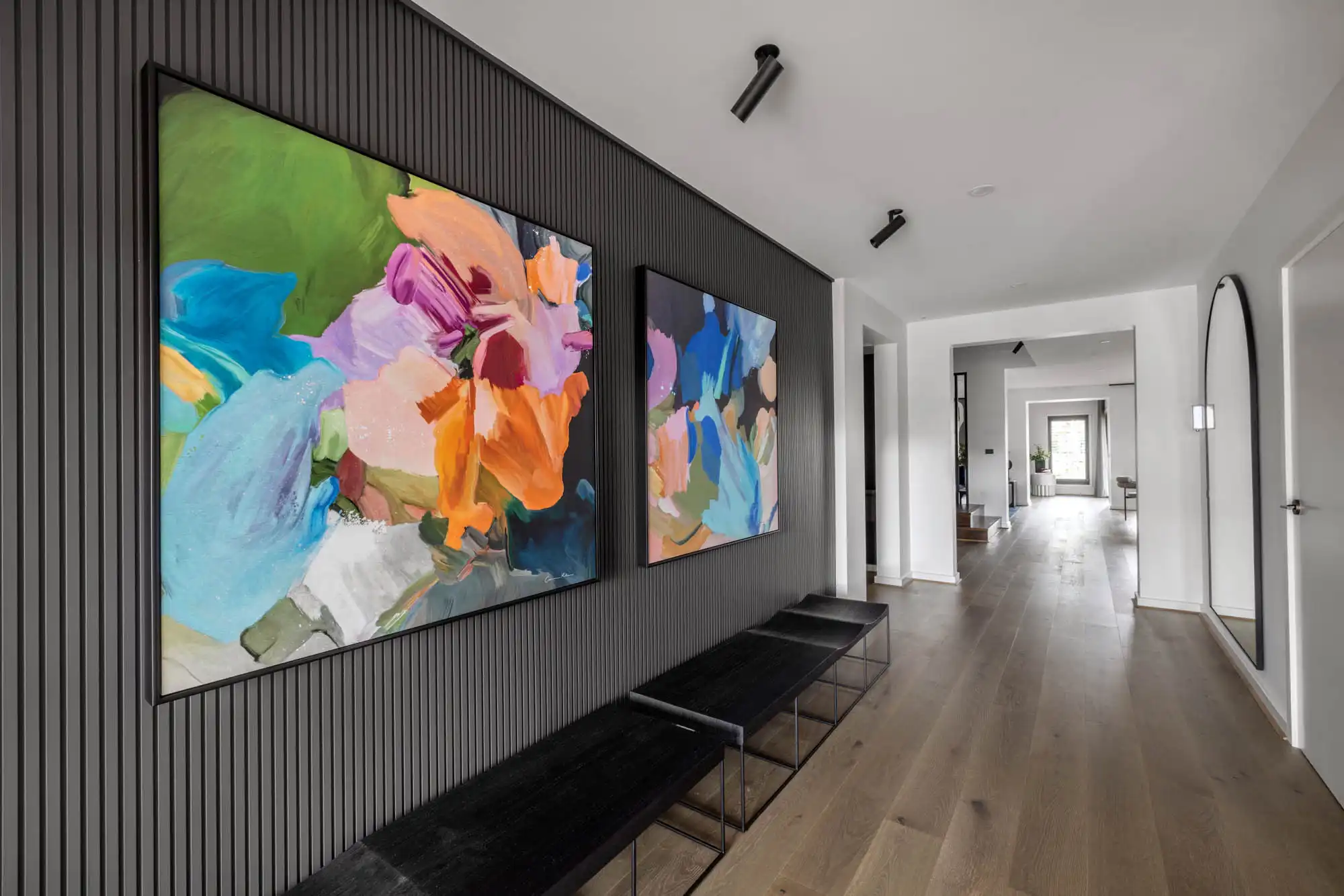 modern contemporary style home with dark tone paneling with lighting to face the statement artwork at silverton 45 in lilydale