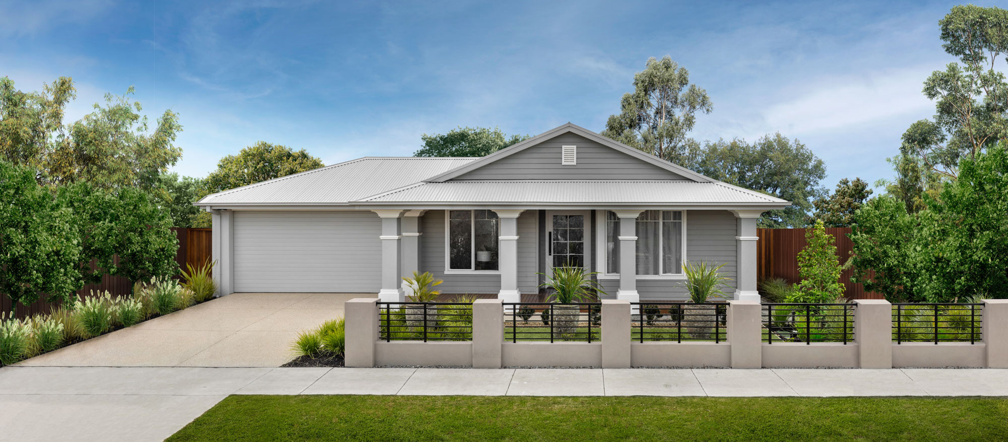 An exterior image of a single storey home with a garage space and a front yard as a part of Simonds Akuna 29 facade.